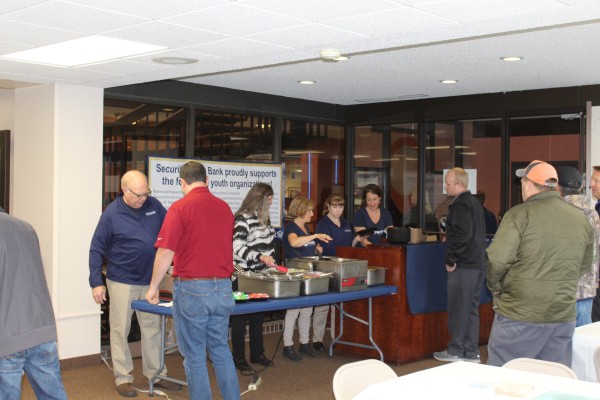 SSB Hibbing employees serving tacos.